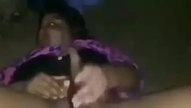 Nude desi lady fucks her hairy pussy with a brinjal