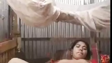 Big-assed Desi whore spreads legs to rub her twat for XXX video